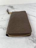 LOUIS VUITTON Monogram Terre Brown Empreinte Zippy Wallet