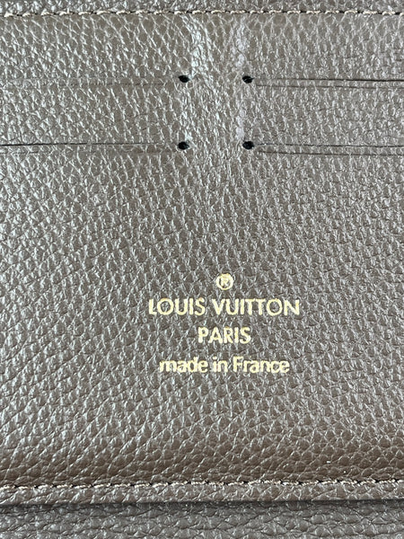 LOUIS VUITTON Monogram Terre Brown Empreinte Zippy Wallet