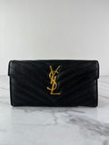 SAINT LAURENT BLACK CASSANDRE MATELASSÉ LARGE FLAP WALLET IN GRAIN DE POUDRE LEATHER