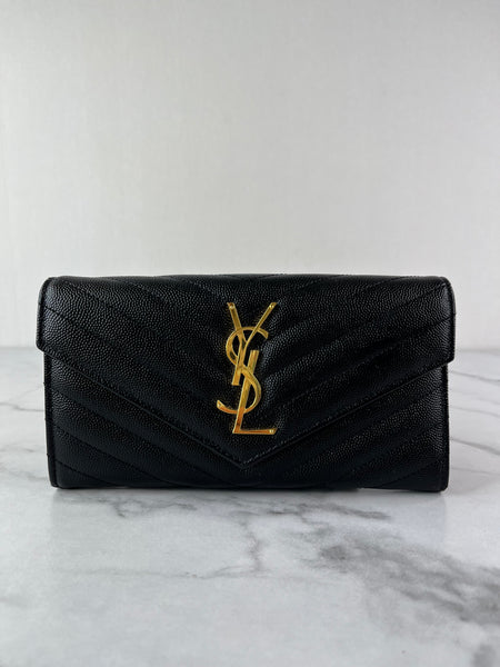SAINT LAURENT BLACK CASSANDRE MATELASSÉ LARGE FLAP WALLET IN GRAIN DE POUDRE LEATHER