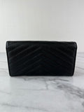 SAINT LAURENT BLACK CASSANDRE MATELASSÉ LARGE FLAP WALLET IN GRAIN DE POUDRE LEATHER