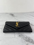 SAINT LAURENT BLACK CASSANDRE MATELASSÉ LARGE FLAP WALLET IN GRAIN DE POUDRE LEATHER