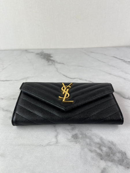 SAINT LAURENT BLACK CASSANDRE MATELASSÉ LARGE FLAP WALLET IN GRAIN DE POUDRE LEATHER