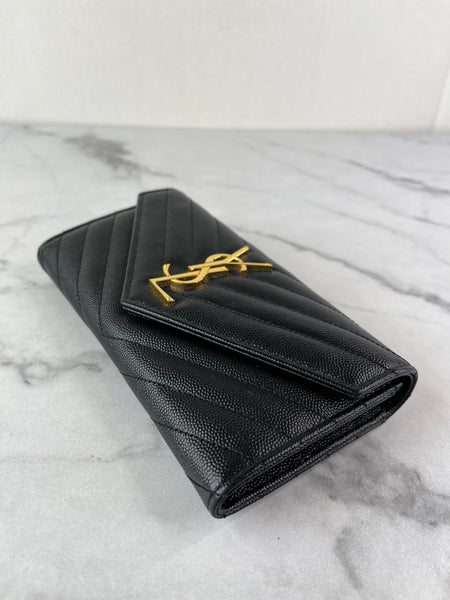 SAINT LAURENT BLACK CASSANDRE MATELASSÉ LARGE FLAP WALLET IN GRAIN DE POUDRE LEATHER