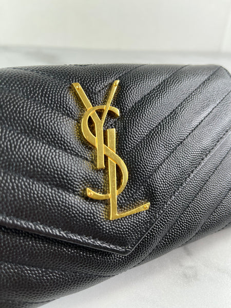 SAINT LAURENT BLACK CASSANDRE MATELASSÉ LARGE FLAP WALLET IN GRAIN DE POUDRE LEATHER