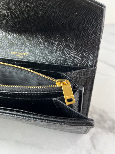 SAINT LAURENT BLACK CASSANDRE MATELASSÉ LARGE FLAP WALLET IN GRAIN DE POUDRE LEATHER