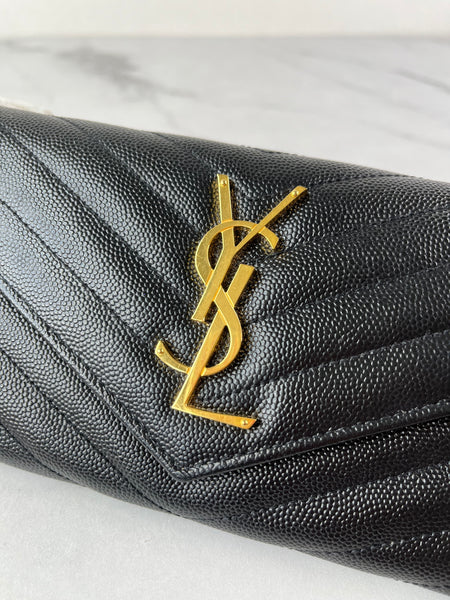 SAINT LAURENT BLACK CASSANDRE MATELASSÉ LARGE FLAP WALLET IN GRAIN DE POUDRE LEATHER
