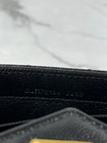 SAINT LAURENT BLACK CASSANDRE MATELASSÉ LARGE FLAP WALLET IN GRAIN DE POUDRE LEATHER