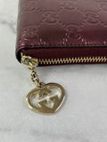 GUCCI Guccissima Metallic Burgundy Patent Zip Around Long Wallet