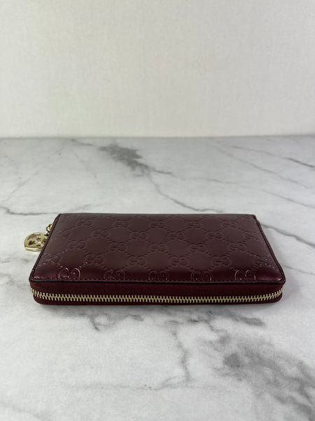 GUCCI Guccissima Metallic Burgundy Patent Zip Around Long Wallet