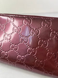 GUCCI Guccissima Metallic Burgundy Patent Zip Around Long Wallet