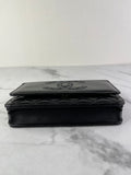 CHANEL Black CC Quilted Shiny Aged Calfskin Wallet On Chain crossbody/shoulder bag