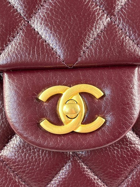 CHANEL Burgundy Grained Calfskin Quilted XXL Travel Flap Bag