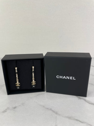 CHANEL Long Crystal CC Camellia Earrings