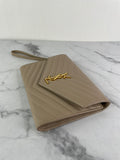 SAINT LAURENT DARK BEIGE CASSANDRE MATELASSÉ FLAP POUCH/WRISTLET