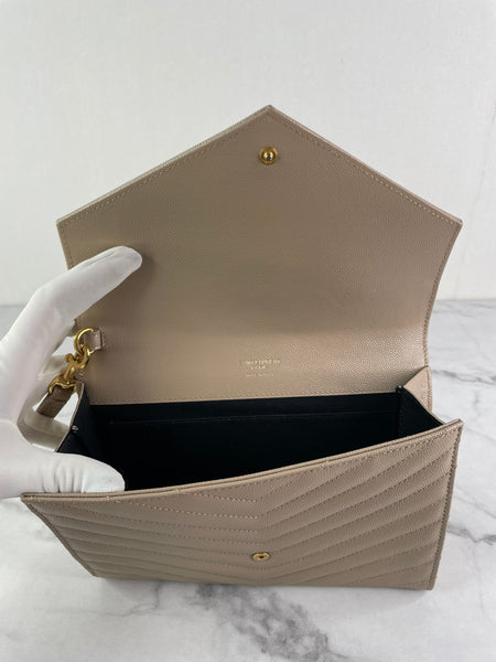 SAINT LAURENT DARK BEIGE CASSANDRE MATELASSÉ FLAP POUCH/WRISTLET