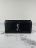 SAINT LAURENT BLACK CASSANDRE MATELASSÉ ZIP AROUND WALLET IN GRAIN DE POUDRE LEATHER