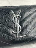SAINT LAURENT BLACK CASSANDRE MATELASSÉ ZIP AROUND WALLET IN GRAIN DE POUDRE LEATHER