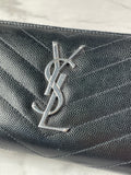 SAINT LAURENT BLACK CASSANDRE MATELASSÉ ZIP AROUND WALLET IN GRAIN DE POUDRE LEATHER