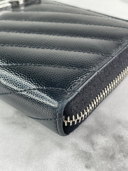 SAINT LAURENT BLACK CASSANDRE MATELASSÉ ZIP AROUND WALLET IN GRAIN DE POUDRE LEATHER