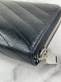 SAINT LAURENT BLACK CASSANDRE MATELASSÉ ZIP AROUND WALLET IN GRAIN DE POUDRE LEATHER