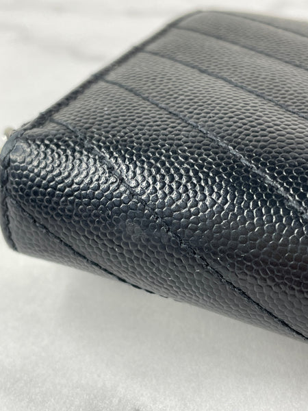 SAINT LAURENT BLACK CASSANDRE MATELASSÉ ZIP AROUND WALLET IN GRAIN DE POUDRE LEATHER