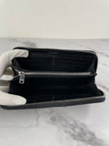 SAINT LAURENT BLACK CASSANDRE MATELASSÉ ZIP AROUND WALLET IN GRAIN DE POUDRE LEATHER