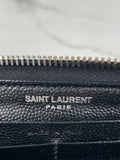 SAINT LAURENT BLACK CASSANDRE MATELASSÉ ZIP AROUND WALLET IN GRAIN DE POUDRE LEATHER